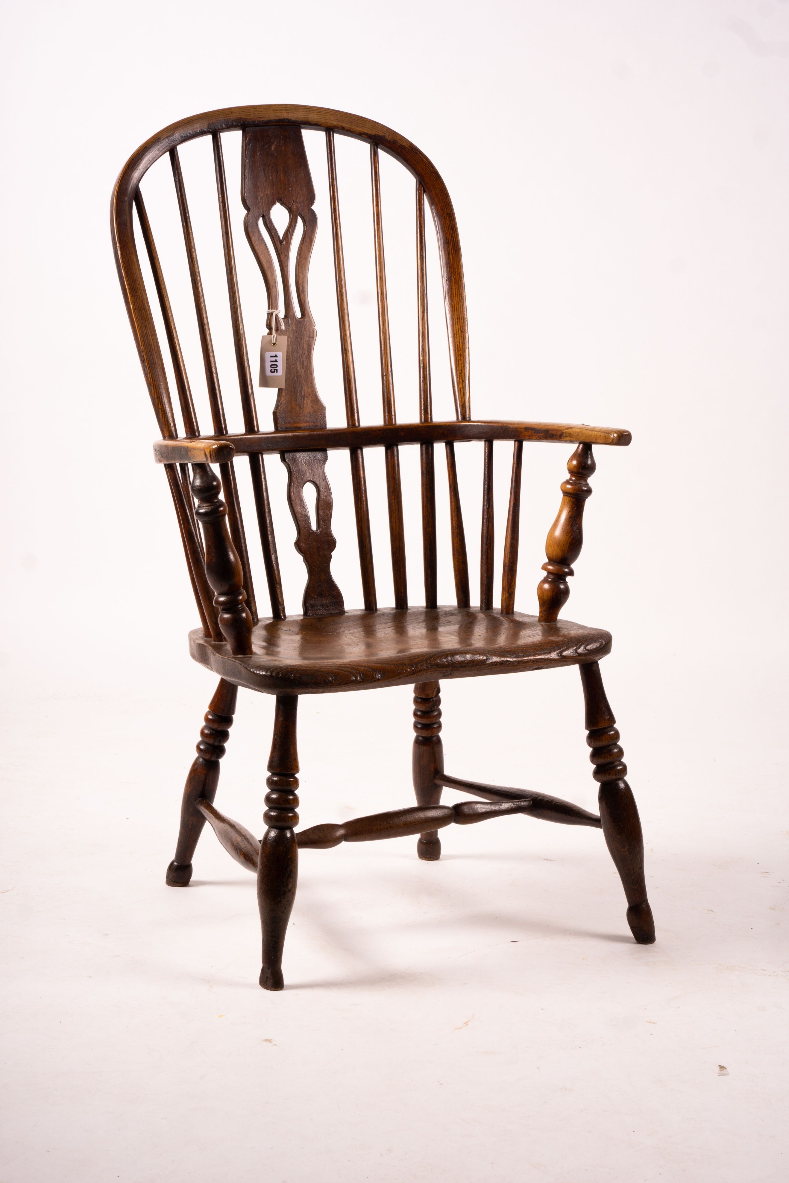 An early 19th century ash, elm and fruitwood Derbyshire area Windsor armchair with 'H' stretcher, width 56cm, depth 44cm, height 106cm